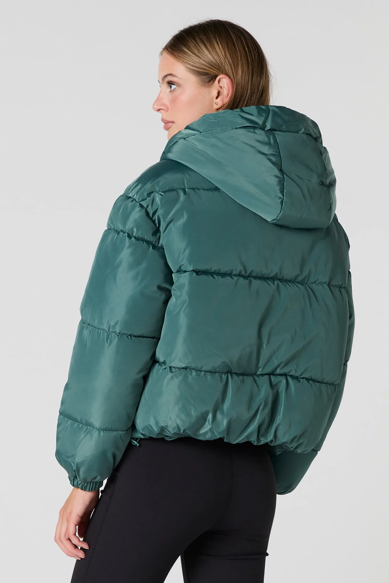 Blouson bouffant avec capuchon et taille coulissante