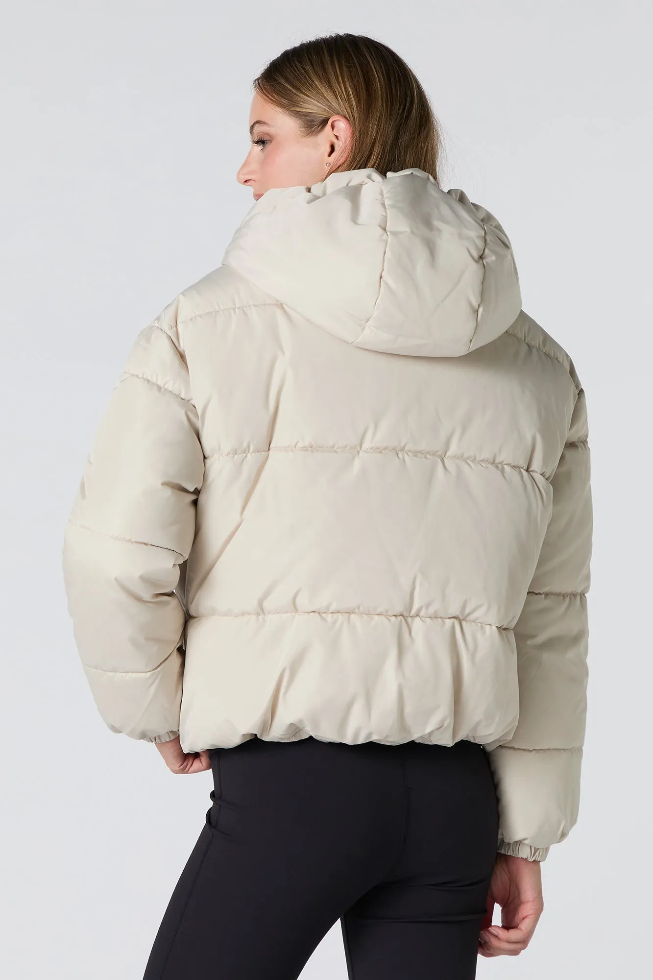 Blouson bouffant avec capuchon et taille coulissante