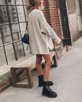 Sure! How about Cozy and Stylish Light Long Knitted Sweater?